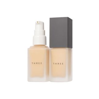 THREE THREE アルティメイトプロテクティブプリスティーン プライマー 01 グロー 30ml SPF32 PA+++の画像